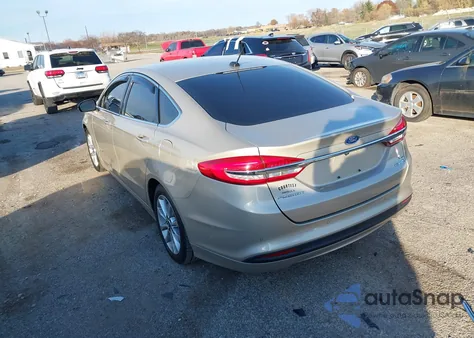 2017 Ford Fusion Hybrid Se z USA, uszkodzony, nr VIN 3FA6P0LUXHR104176